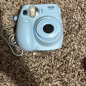 Blue polaroid camera